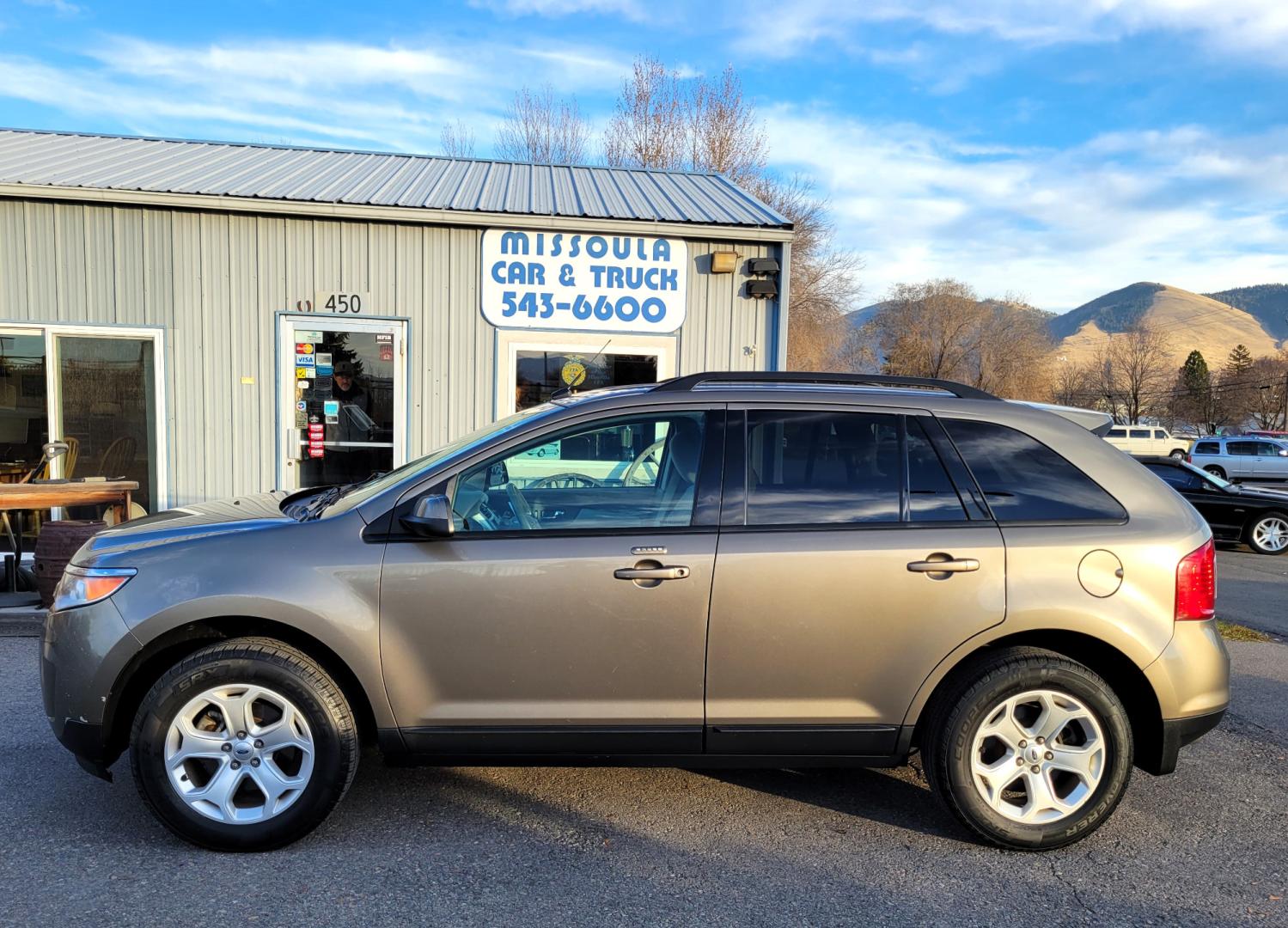 2013 Grey /Gray Ford Edge SEL (2FMDK4JC9DB) with an 3.5L V6 engine, 6-Speed Automatic transmission, located at 450 N Russell, Missoula, MT, 59801, (406) 543-6600, 46.874496, -114.017433 - Nice All Wheel Drive. Air. Cruise. Tilt. Power Windows and Locks. Bluetooth. Nice Cooper Tires. - Photo#0